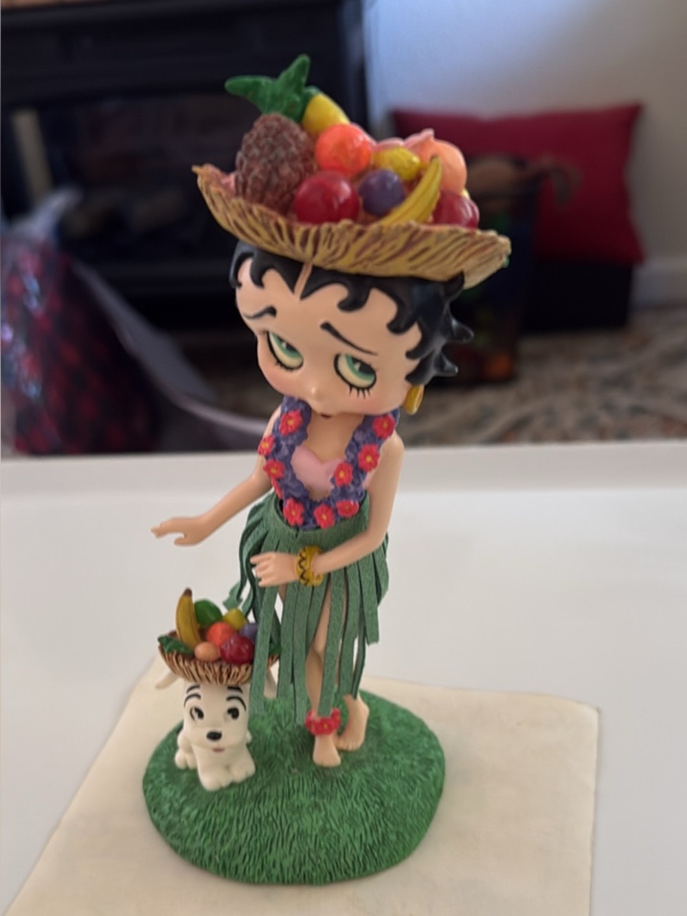 Betty Boop Hula Figurine with Green Skirt and Multicolored Fruit Hat